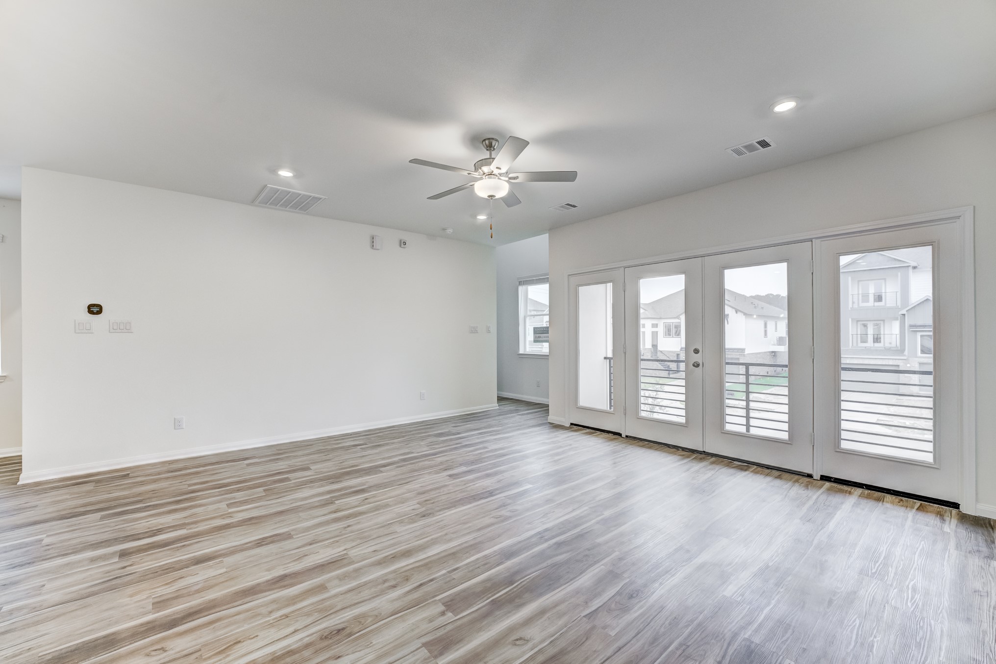20646 Dynamic Court Humble, TX 77338 - Photo 14 of 40 a view of an empty room with a window and wooden floor