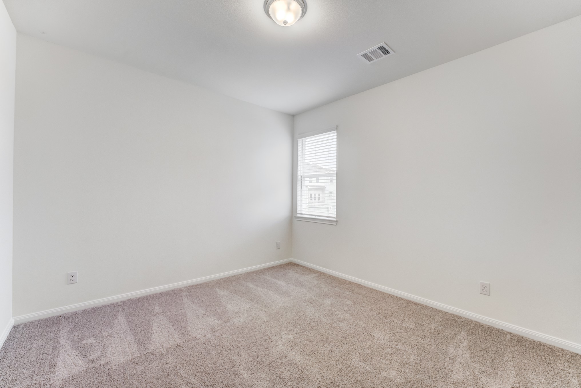 20646 Dynamic Court Humble, TX 77338 - Photo 17 of 40 a view of an empty room and a window
