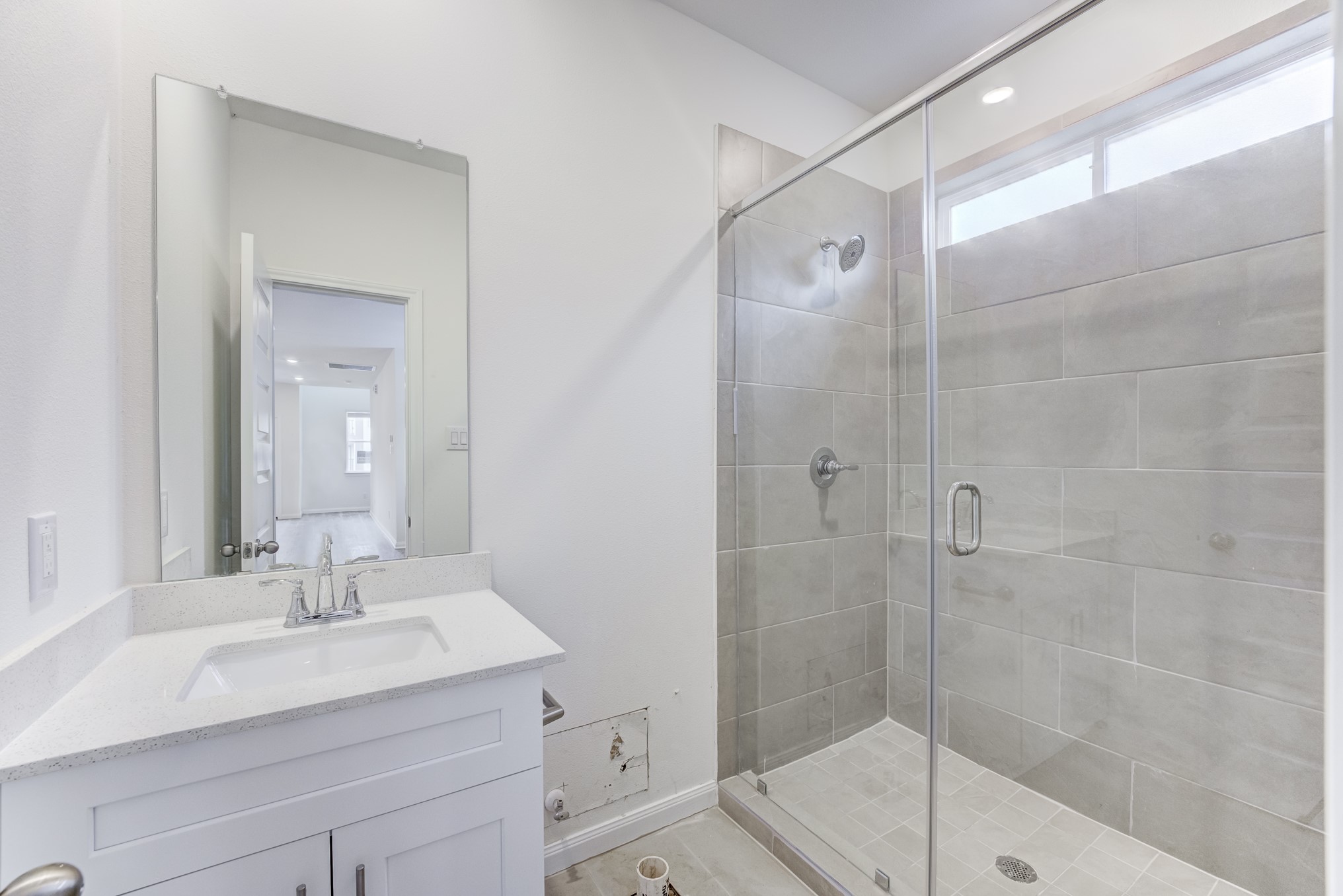 20646 Dynamic Court Humble, TX 77338 - Photo 19 of 40 a bathroom with a shower sink and mirror