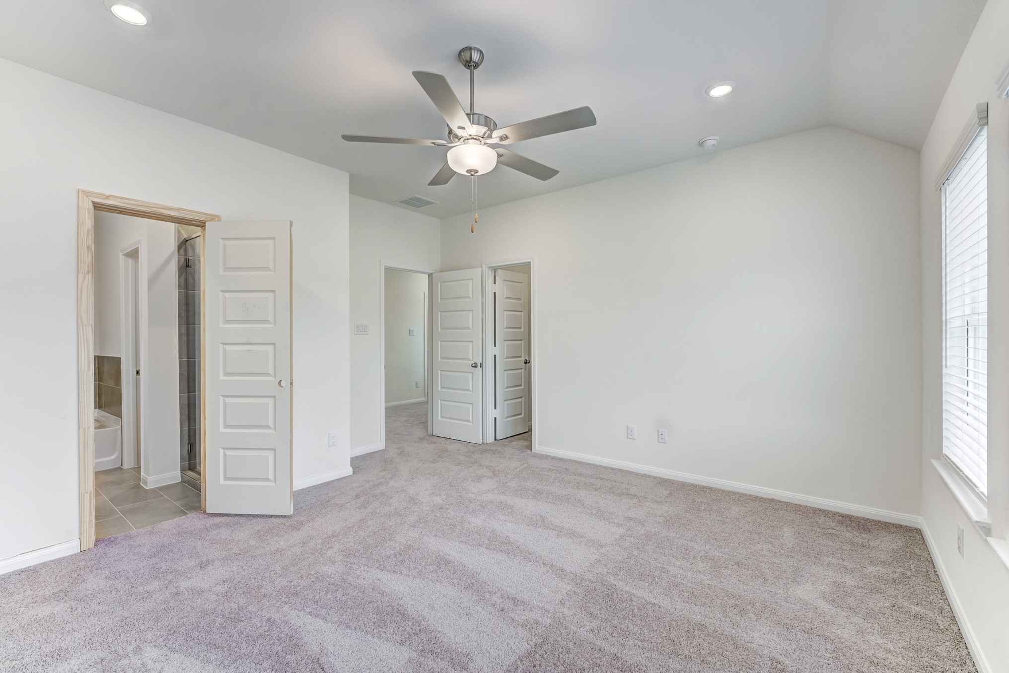 20646 Dynamic Court Humble, TX 77338 - Photo 24 of 40 an empty room with closet and fan