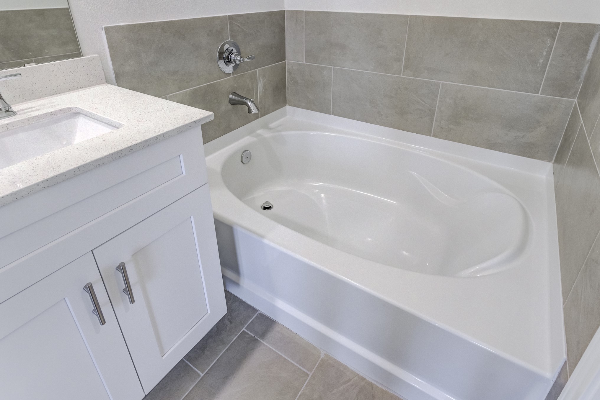 20646 Dynamic Court Humble, TX 77338 - Photo 27 of 40 a white bath tub sitting next to a white sink