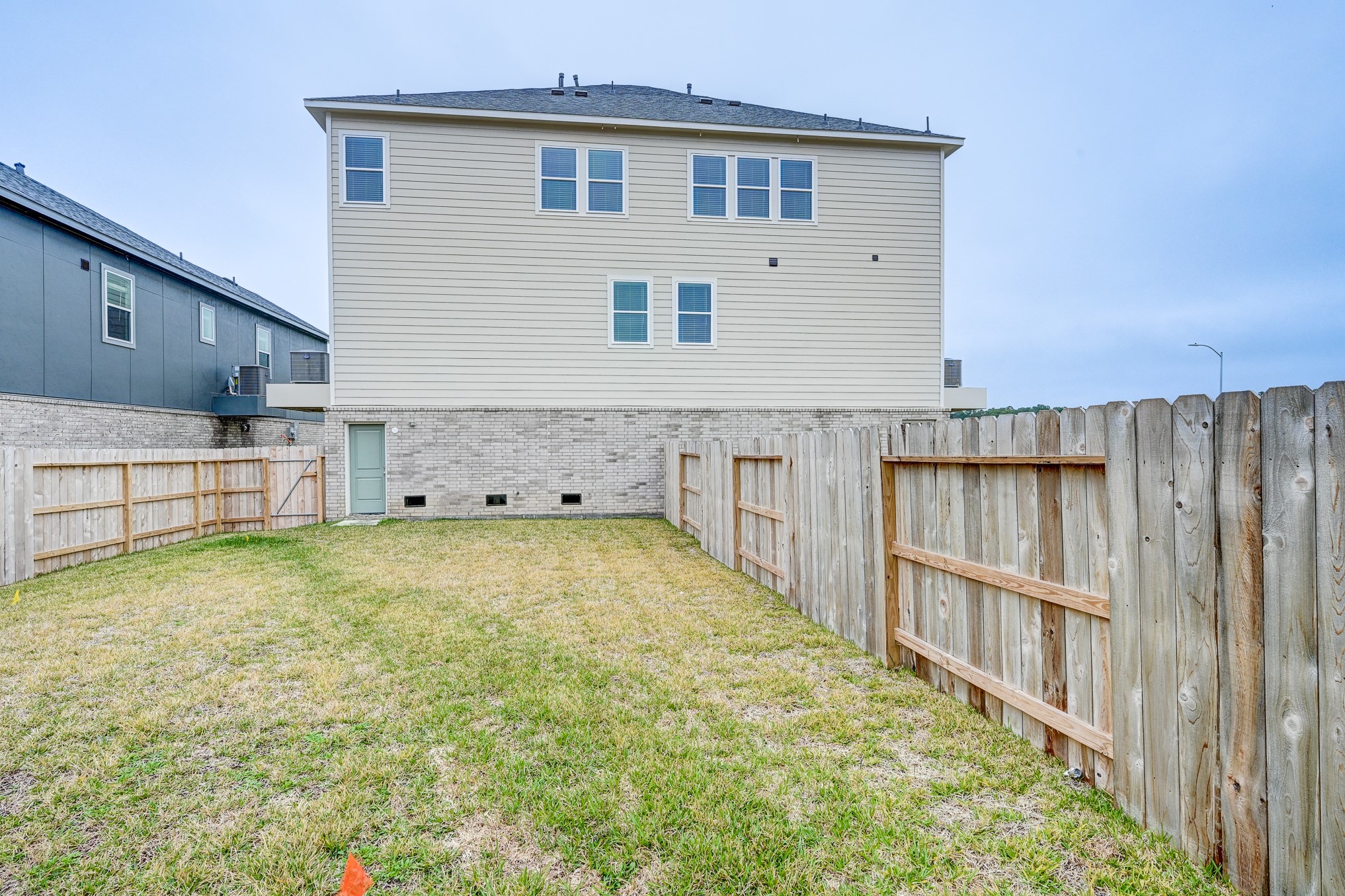 20646 Dynamic Court Humble, TX 77338 - Photo 36 of 40 a view of kitchen with refrigerator and wooden floor
