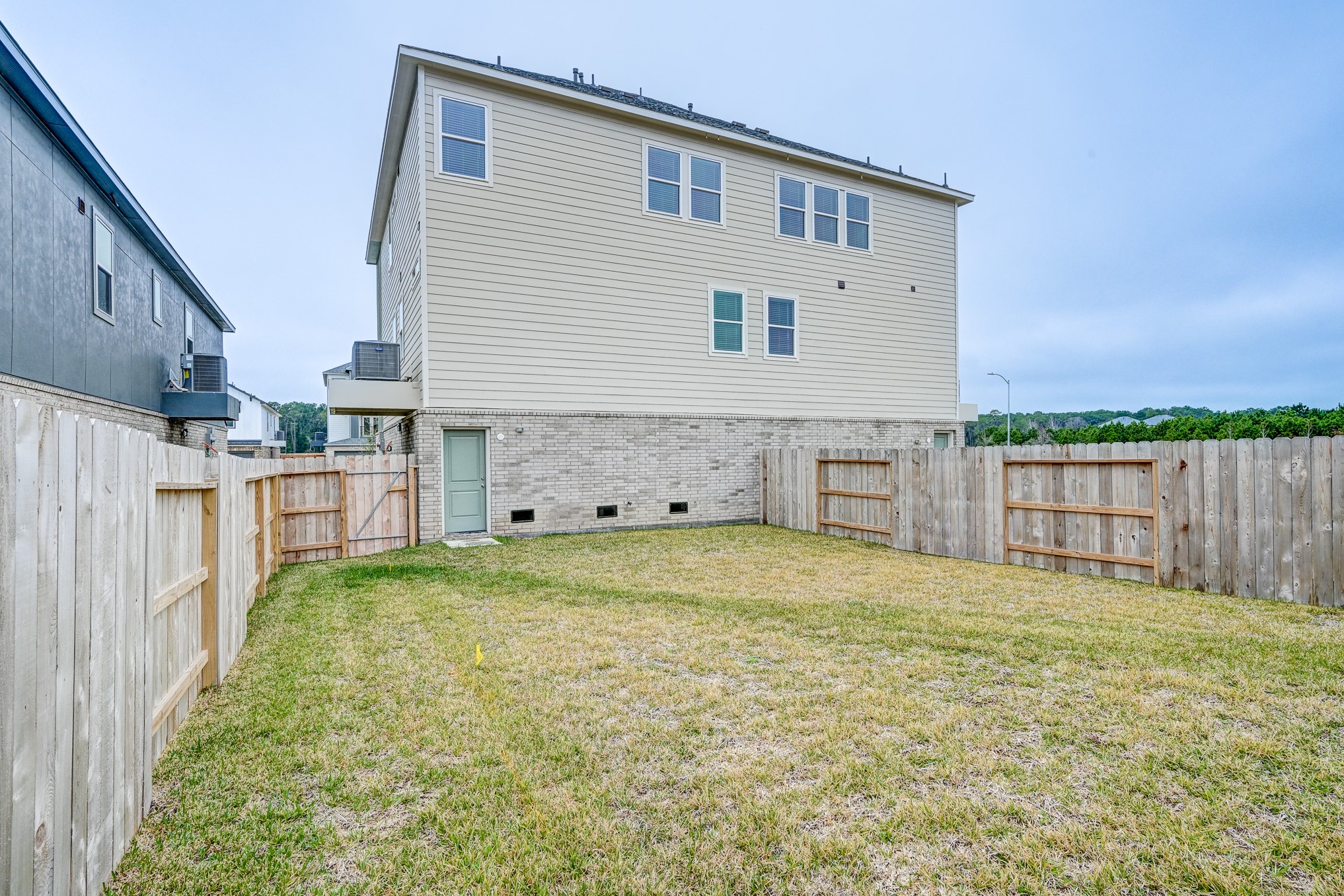 20646 Dynamic Court Humble, TX 77338 - Photo 37 of 40 a view of backyard of house and wooden deck