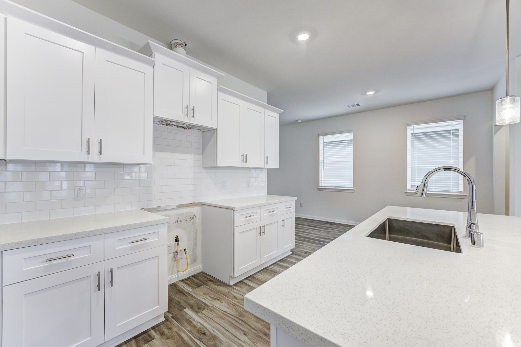 20646 Dynamic Court Humble, TX 77338 - Photo 10 of 40 a kitchen with white cabinets and sink