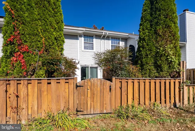 a view of a wooden fence