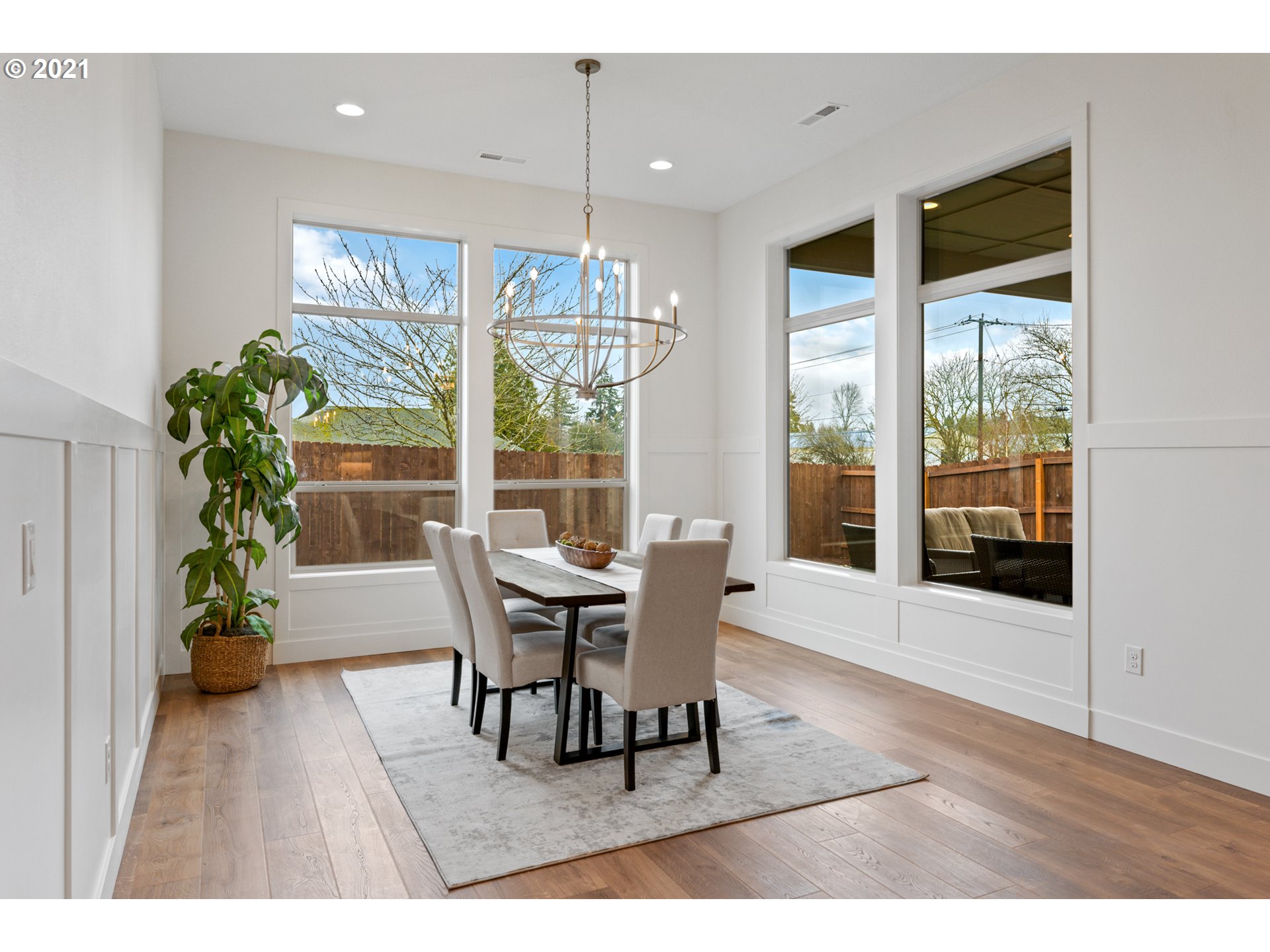 912 South 88th Avenue Ridgefield, WA 98642 - Photo 13 of 32 a dining room with furniture and wooden floor