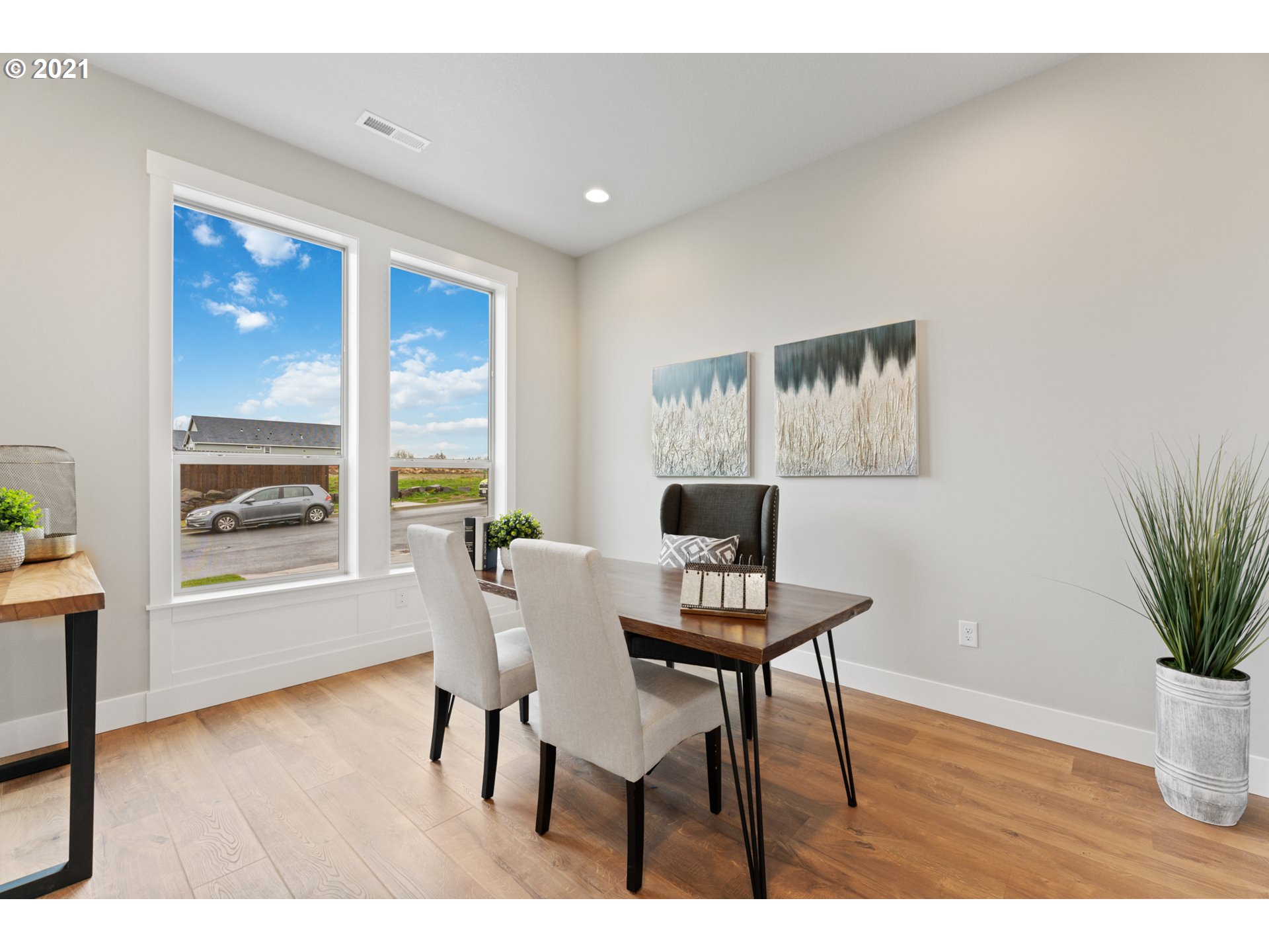 912 South 88th Avenue Ridgefield, WA 98642 - Photo 5 of 32 a view of a livingroom with furniture window and wooden floor