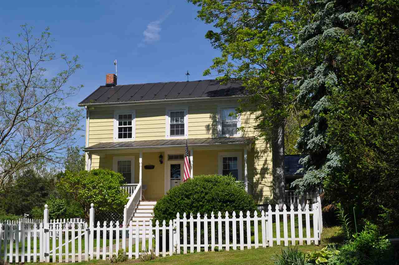 3994 Spring Hill Road Staunton, VA 24401 - Photo 2 of 41 a front view of a house with a garden