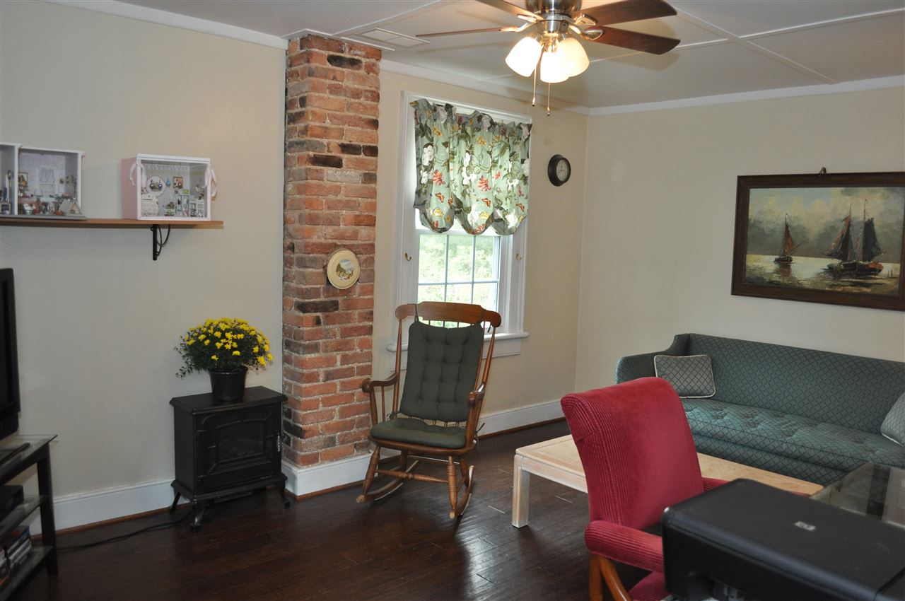 3994 Spring Hill Road Staunton, VA 24401 - Photo 24 of 41 a living room with furniture and a window