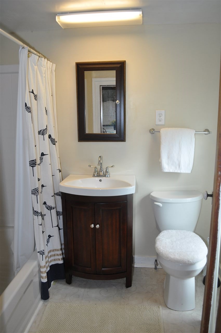 3994 Spring Hill Road Staunton, VA 24401 - Photo 25 of 41 a bathroom with a sink toilet and mirror