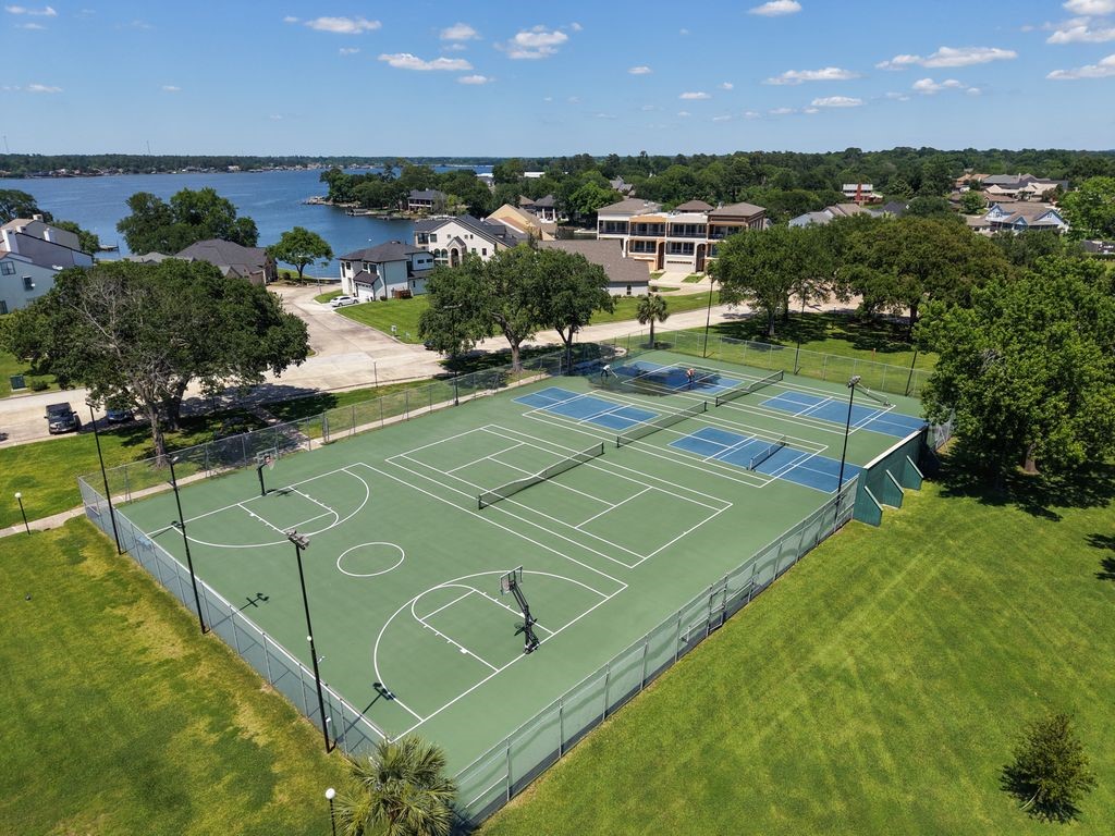 1607 Schooner Point Willis, TX 77318 - Photo 39 of 47 Pickleball, Tennis and Basketball courts available to the residents.