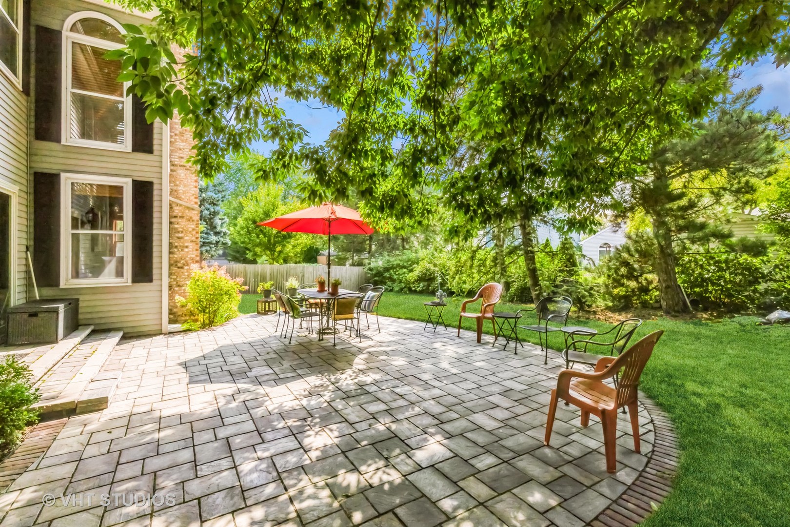 5149 Conifer Lane Gurnee, IL 60031 - Photo 13 of 18 a backyard of a house with table and chairs