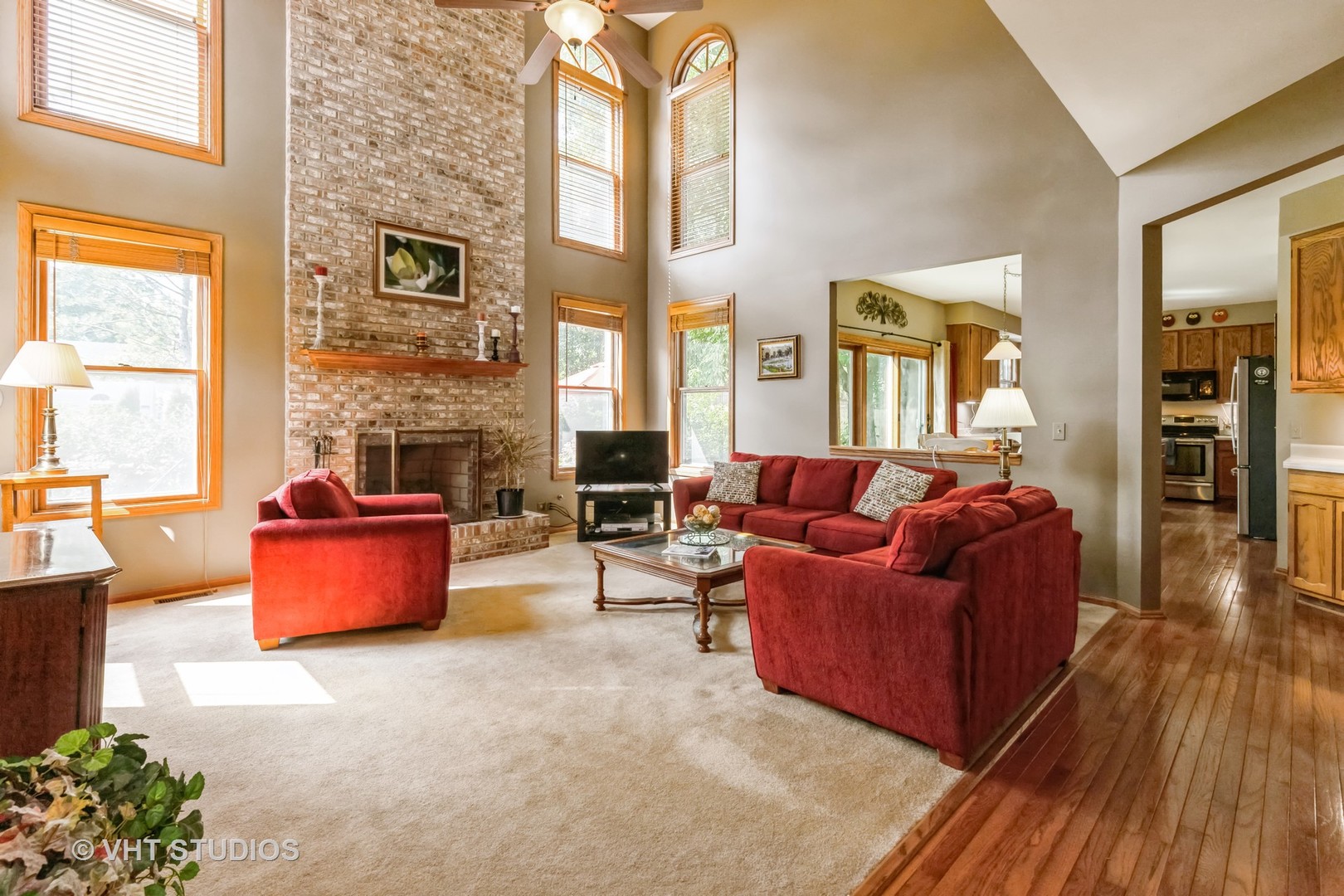 5149 Conifer Lane Gurnee, IL 60031 - Photo 2 of 18 a living room with furniture and a fireplace