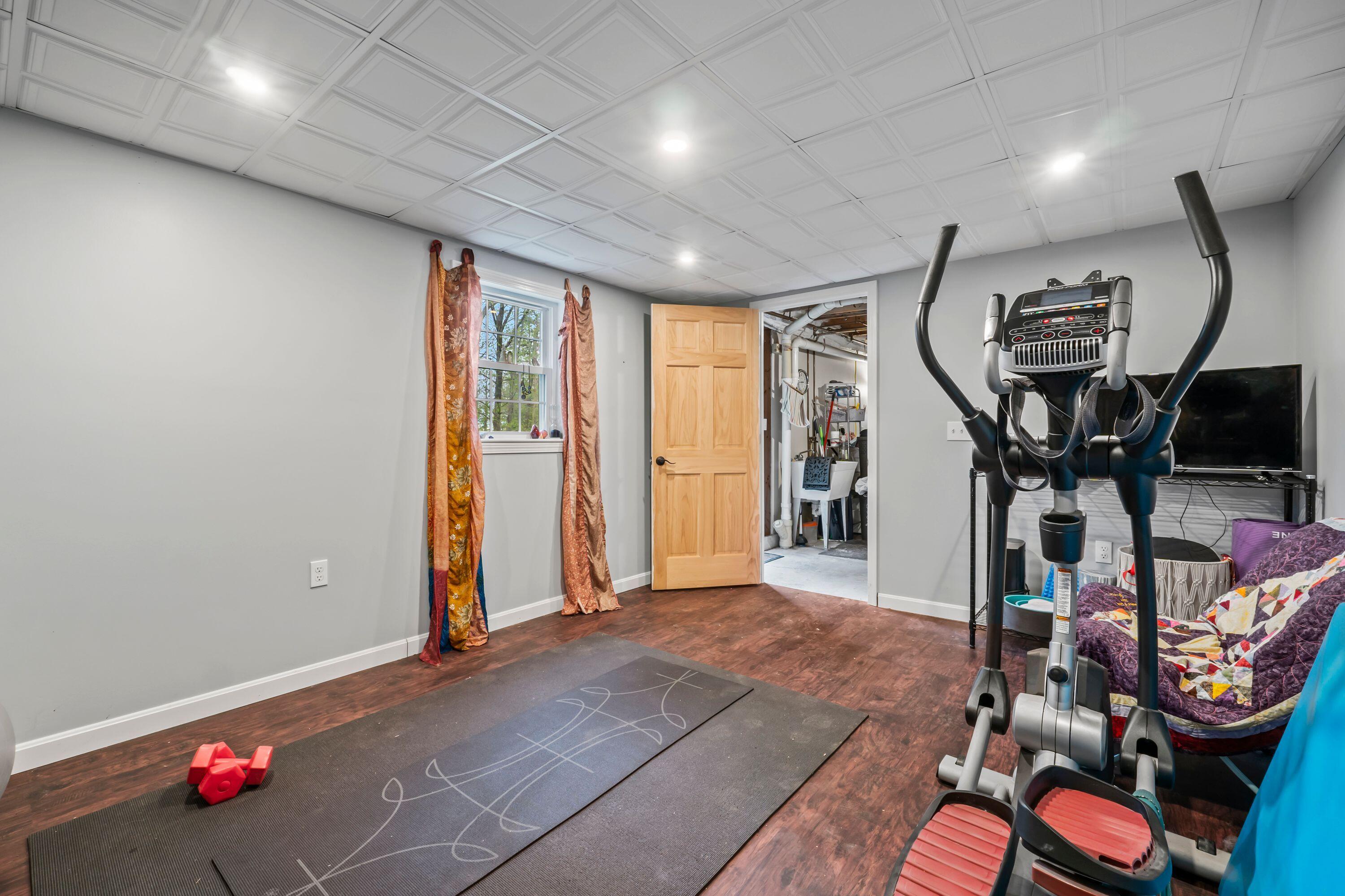 Undisclosed Address Manchester, ME 04351 - Photo 31 of 46 Finished room in basement