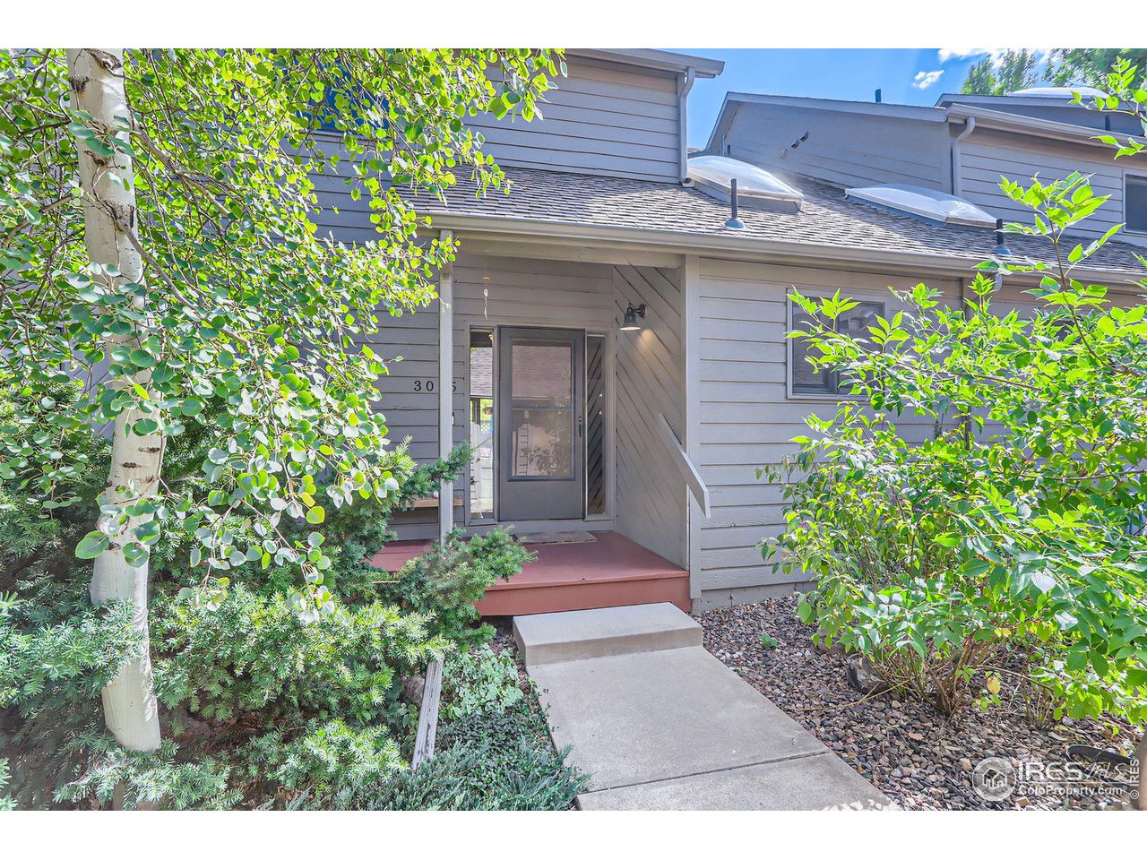 3075 Edison Court Boulder, CO 80301 - Photo 2 of 28 a view of a backyard with plants