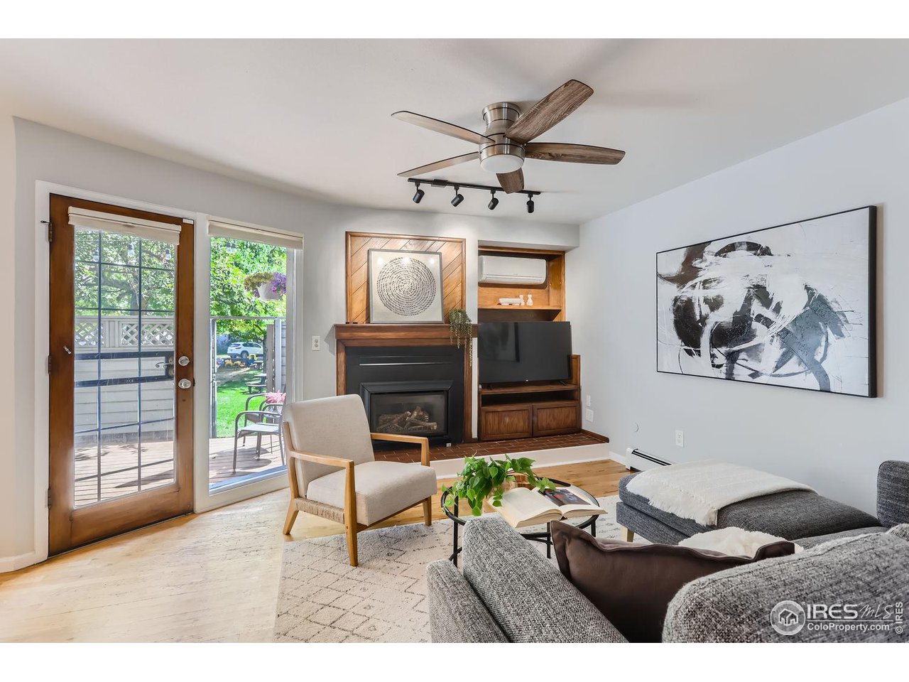 3075 Edison Court Boulder, CO 80301 - Photo 4 of 28 a living room with furniture and a fireplace