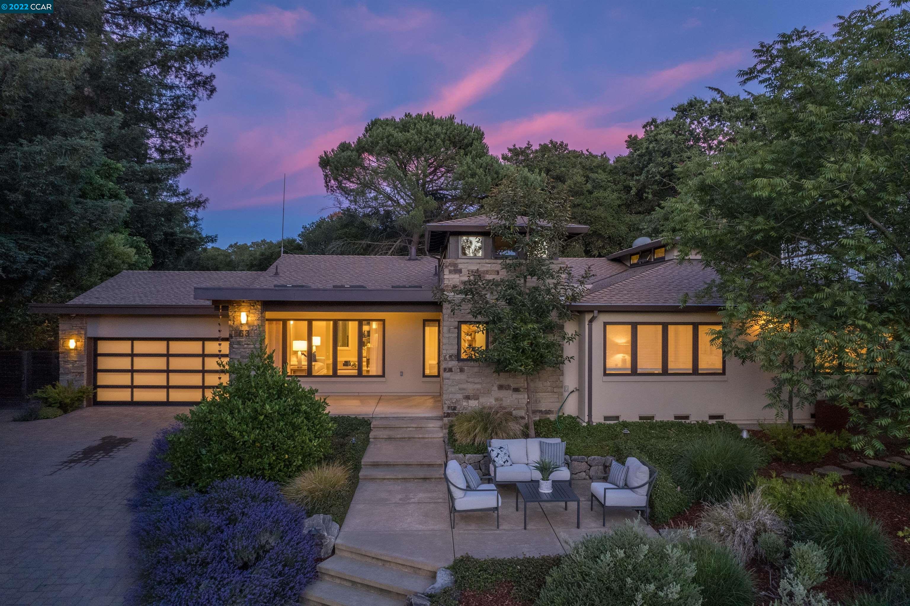 63 Meadow View Road Orinda, CA 94563 - Photo 1 of 1 a front view of a house with a yard