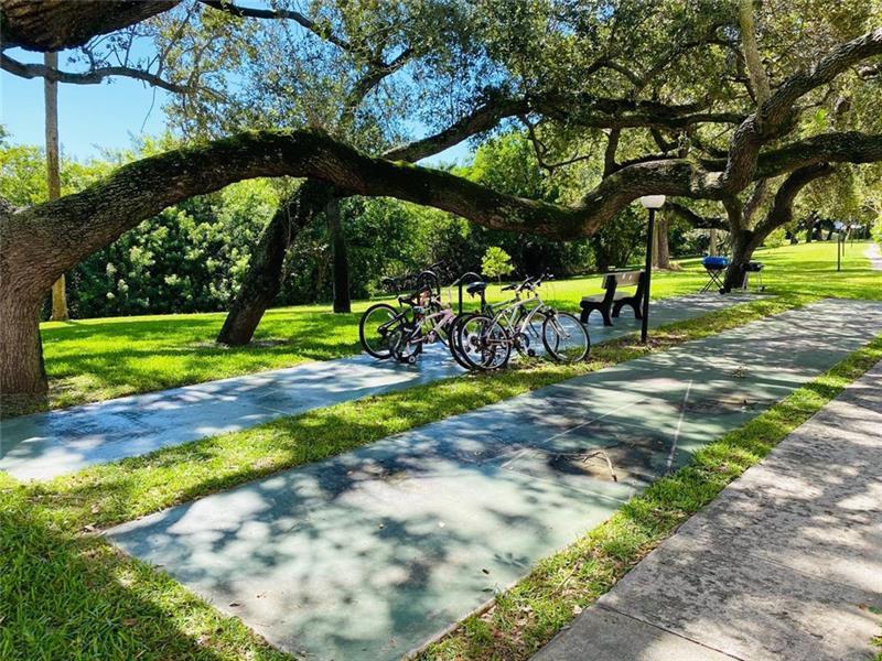 642 Northwest 13th Street, Unit 24 Boca Raton, FL 33486 - Photo 3 of 9 a view of outdoor space with trampoline