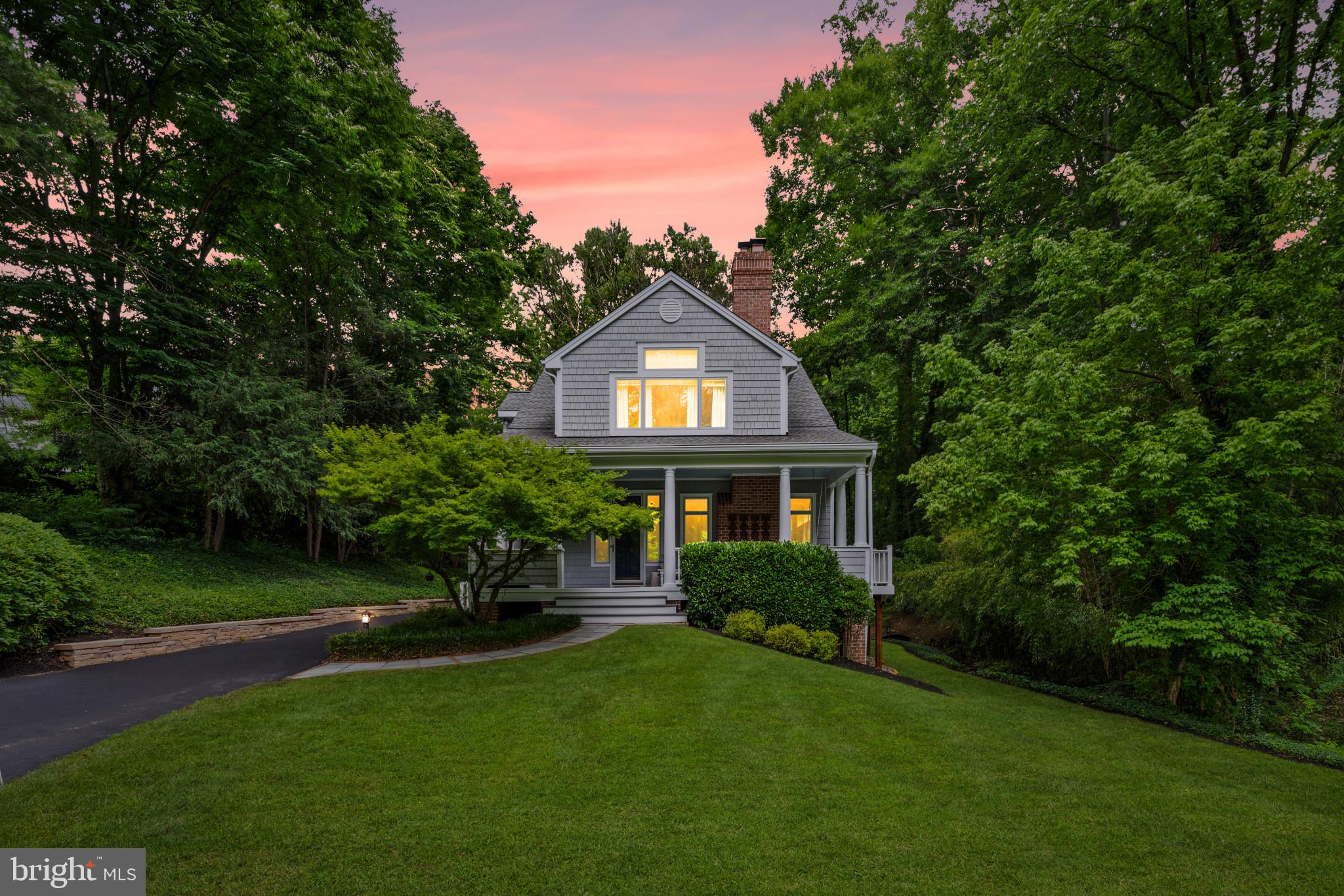 7807 Overbrook Road Ruxton, MD 21204 - Photo 2 of 47 a front view of a house with a garden