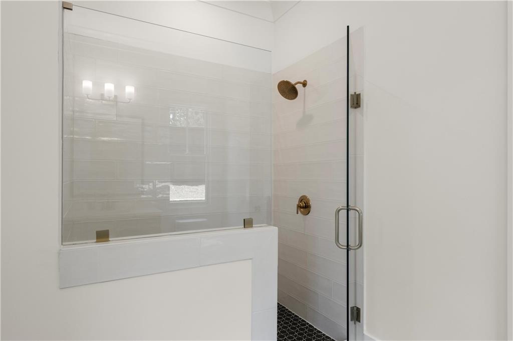 285 Reese Way Ball Ground, GA 30107 - Photo 16 of 30 a bathroom with a shower