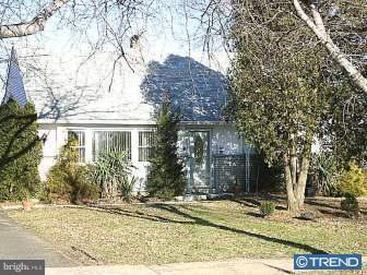 891 Morefield Road Philadelphia, PA 19115 - Photo 1 of 12 a front view of a house with a yard