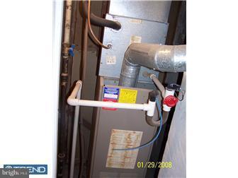 891 Morefield Road Philadelphia, PA 19115 - Photo 12 of 12 a view of storage and utility room with a sink