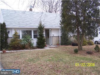 891 Morefield Road Philadelphia, PA 19115 - Photo 5 of 12 front view of a house with a yard