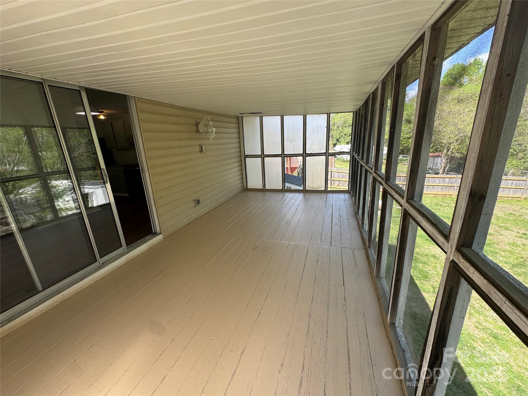 7939 Holly Hill Road Charlotte, NC 28227 - Photo 16 of 38 a view of an empty room with a window