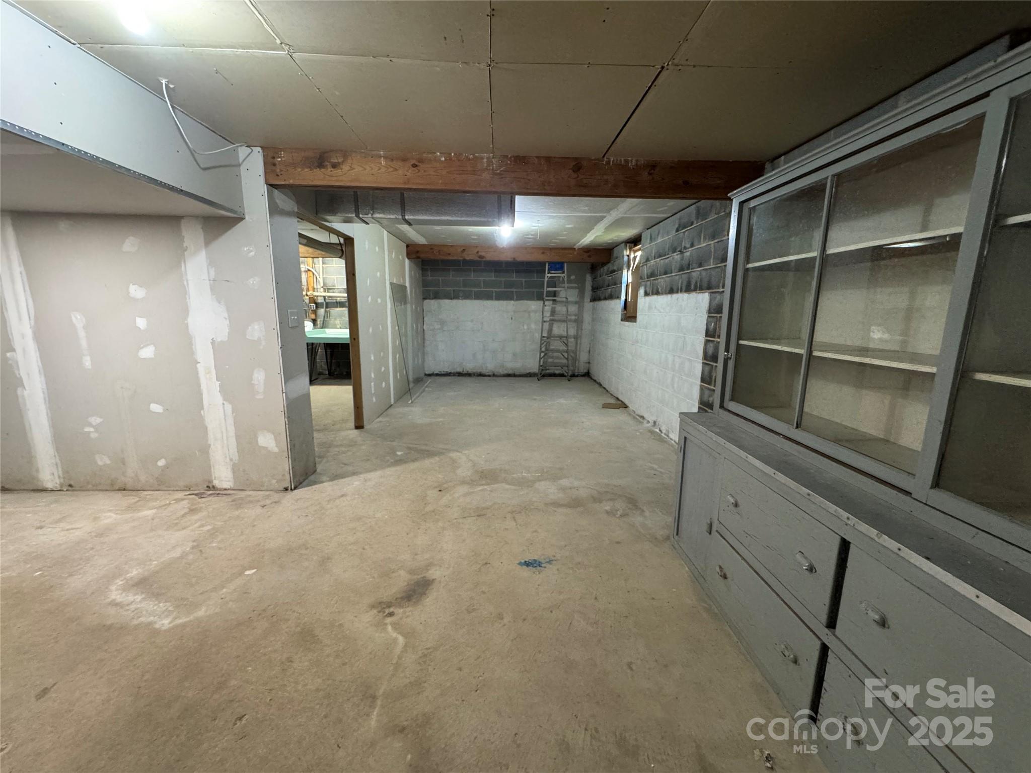 7939 Holly Hill Road Charlotte, NC 28227 - Photo 28 of 38 a view of empty room with wooden floor