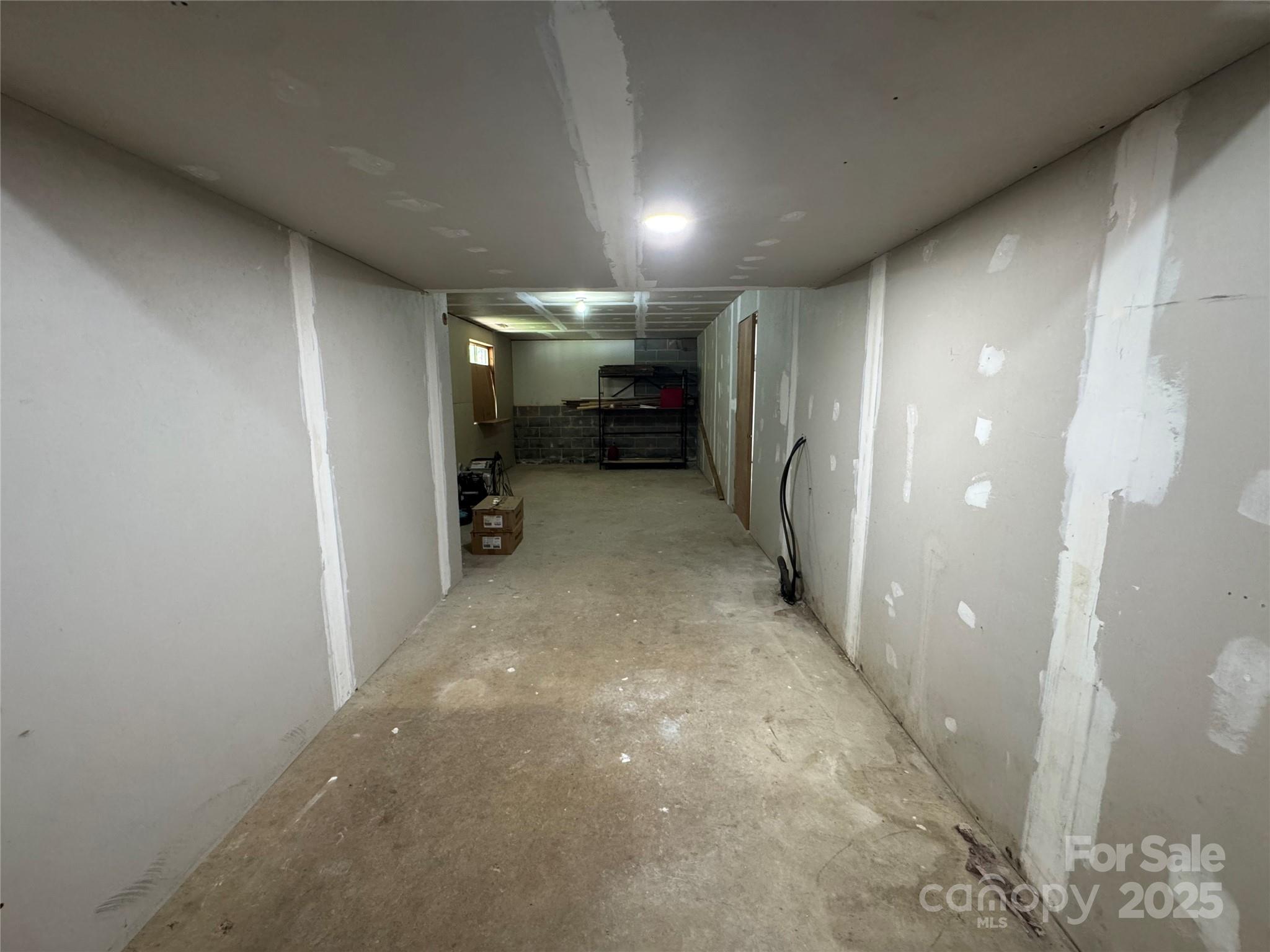 7939 Holly Hill Road Charlotte, NC 28227 - Photo 29 of 38 a view of a hallway