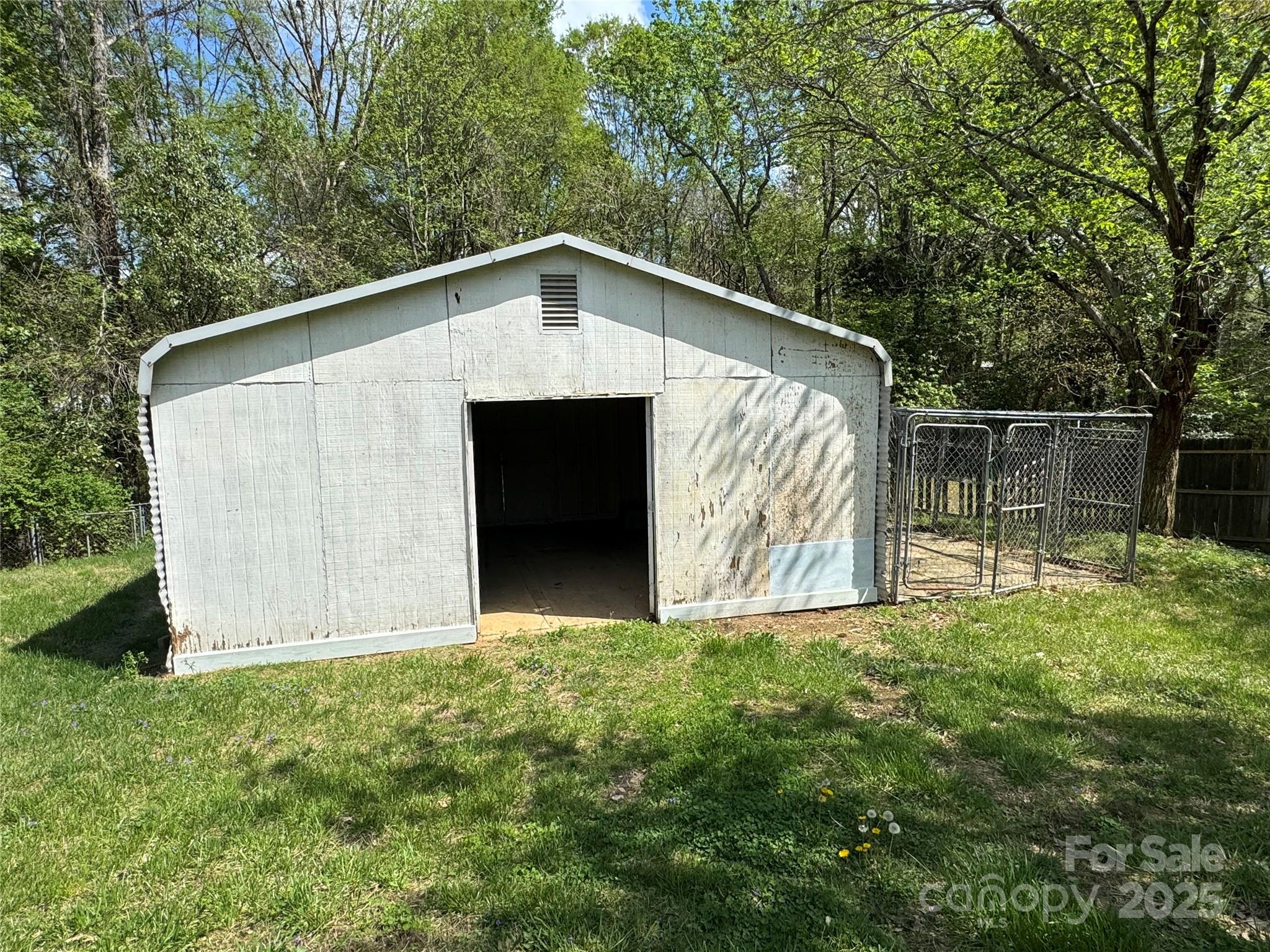 7939 Holly Hill Road Charlotte, NC 28227 - Photo 35 of 38 a front view of house with green space