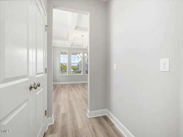 a bathroom with a toilet a sink and a mirror