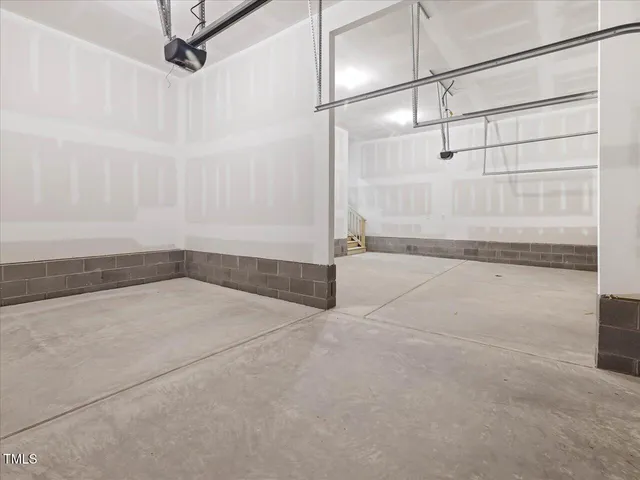 an empty room with closet area