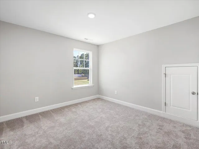 a bathroom with a double vanity sink a and mirror