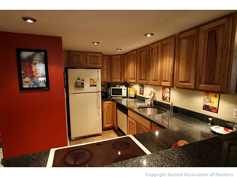 800 Copper Road, Unit 178 Frisco, CO 80443 - Photo 4 of 19 Kitchen. Nice upgrades in the kitchen, tile floor