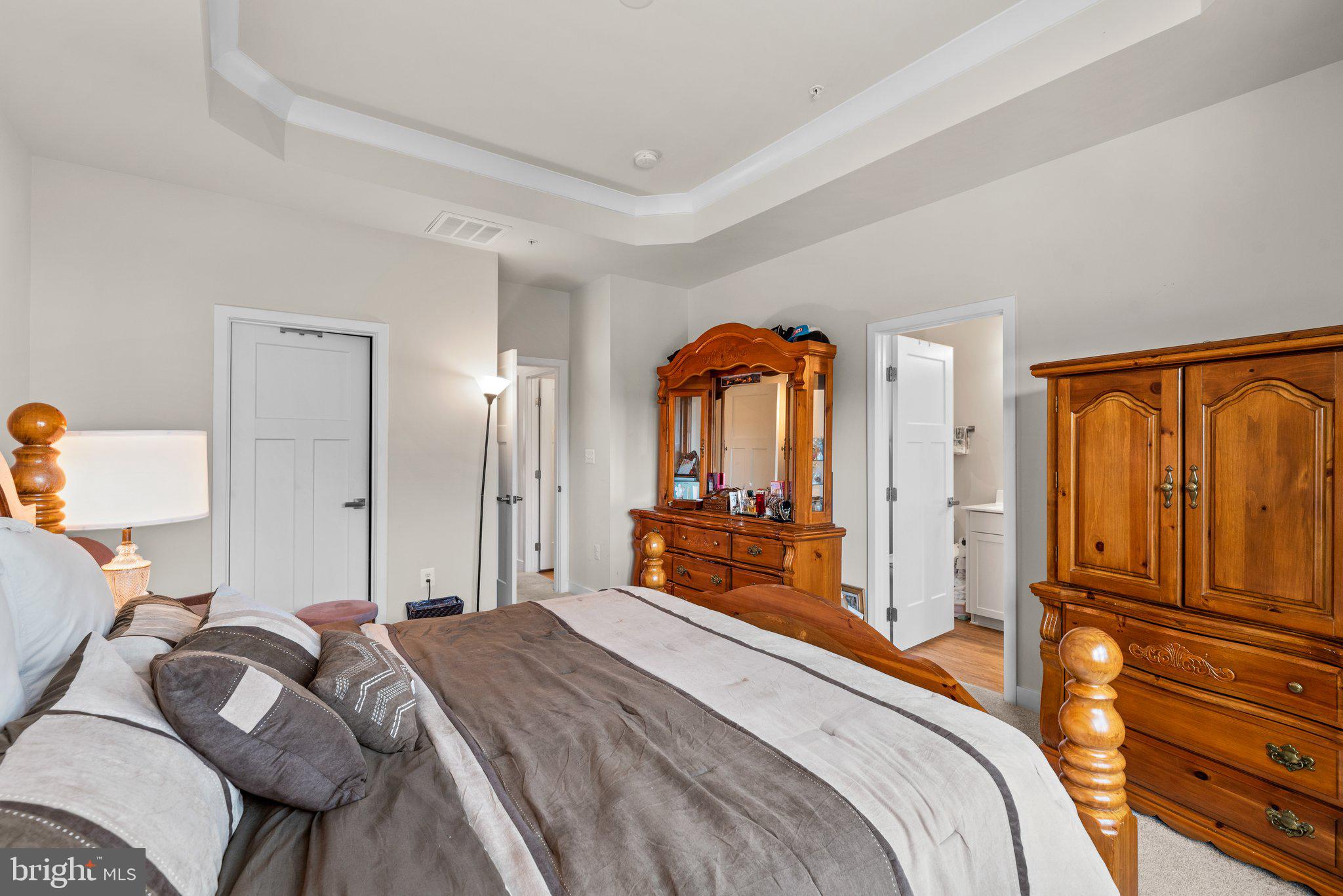 1132 Patuxent Greens Drive Laurel, MD 20708 - Photo 21 of 44 Primary Bedroom w/ Private Bathroom + Tray Ceiling