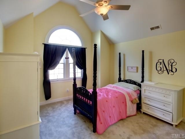 13709 Possum Track Road Raleigh, NC 27614 - Photo 9 of 12 Fabulous secondary bedroom with vaulted ceiling! Huge walk in closet that even leads to tons of unfinished storage that could be future expansion! Brand new carpet in this bedroom! Bedroom
