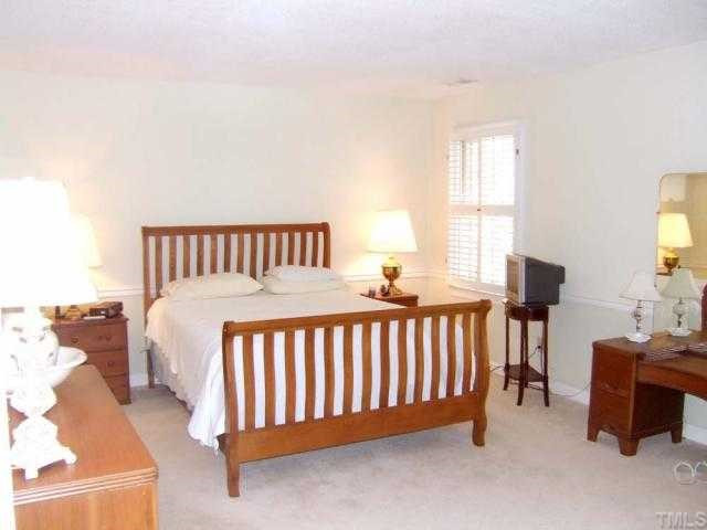 10600 Chinkapin Place Raleigh, NC 27613 - Photo 8 of 12 Master Bedroom