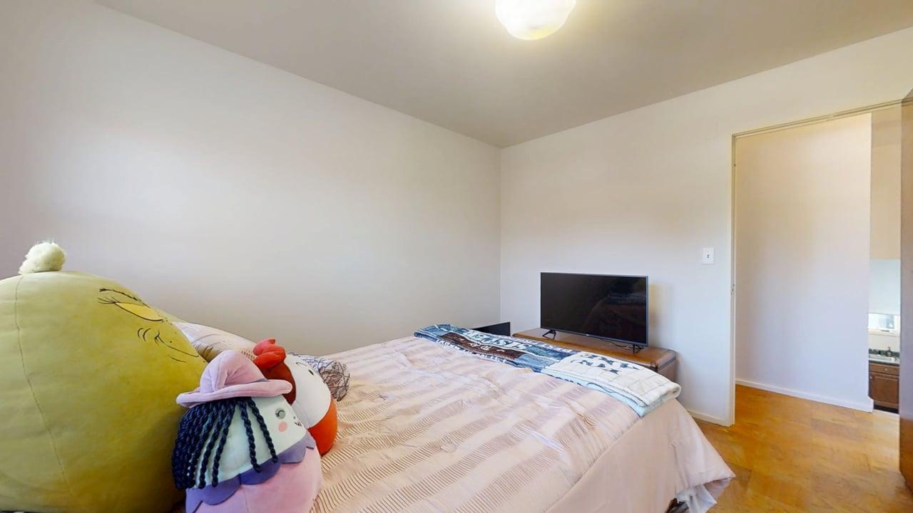 1507 Golfview Road, Unit 1507 Rantoul, IL 61866 - Photo 14 of 24 a bedroom with a bed and flat screen tv