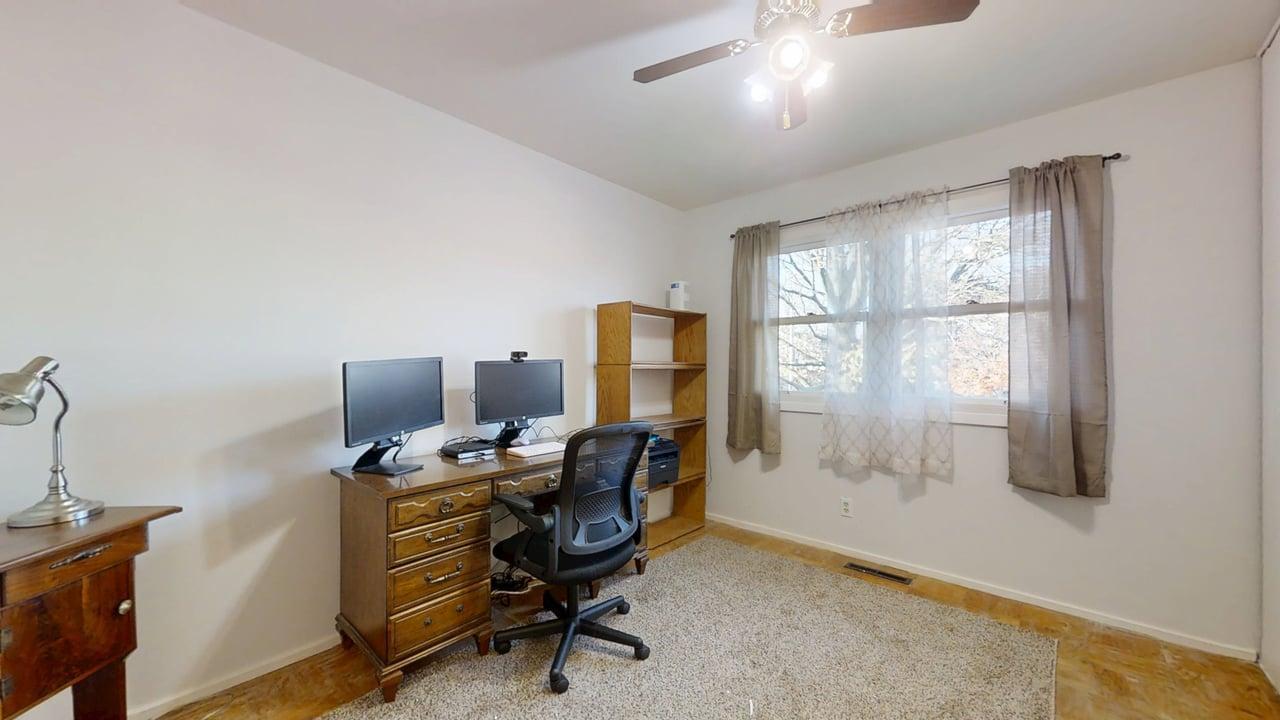 1507 Golfview Road, Unit 1507 Rantoul, IL 61866 - Photo 16 of 24 a view of a workspace with furniture and a window