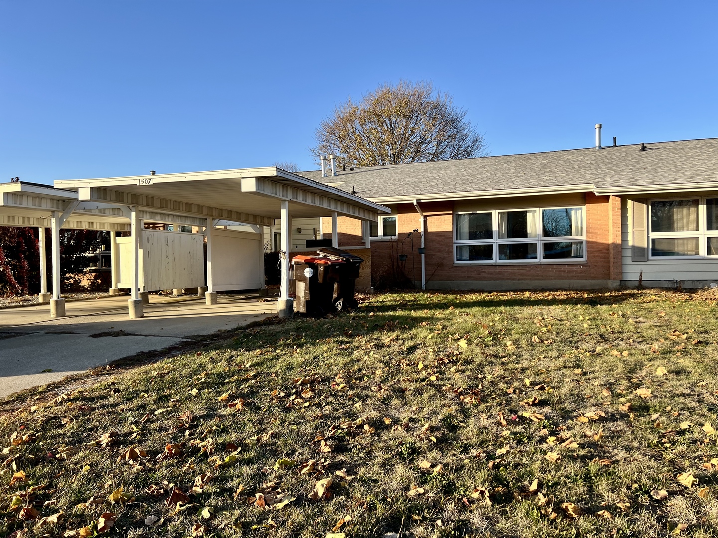 1507 Golfview Road, Unit 1507 Rantoul, IL 61866 - Photo 2 of 24 front view of a house with a porch