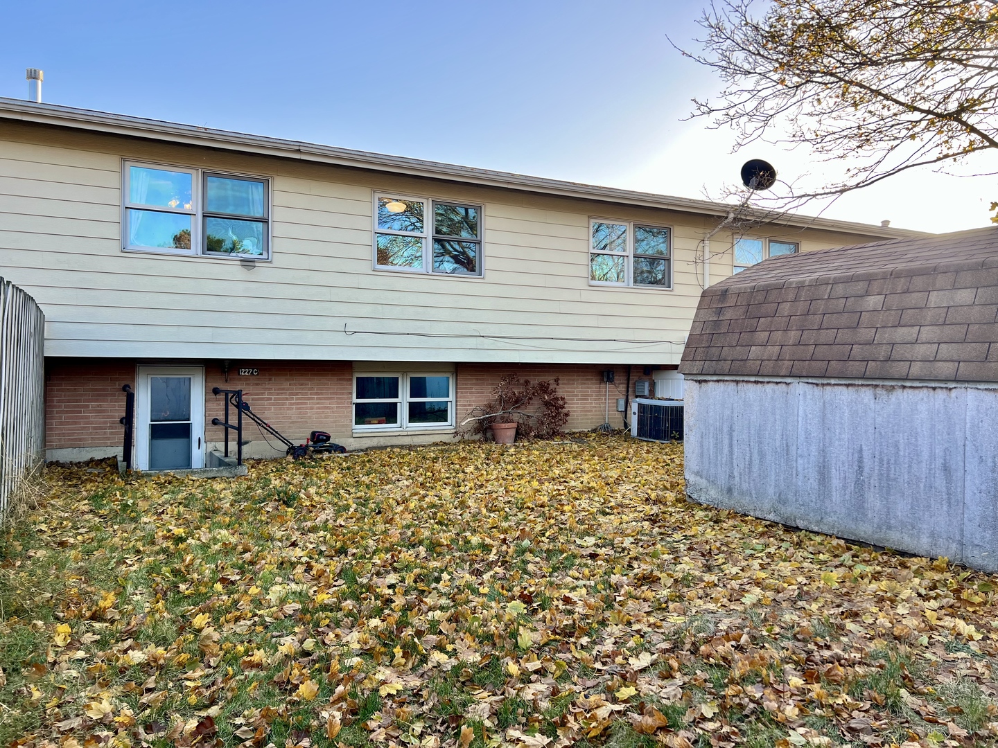 1507 Golfview Road, Unit 1507 Rantoul, IL 61866 - Photo 21 of 24 a house view with a backyard space