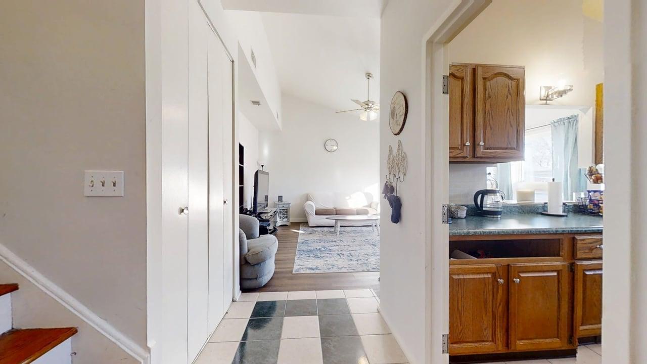 1507 Golfview Road, Unit 1507 Rantoul, IL 61866 - Photo 3 of 24 a view of a kitchen from the hallway
