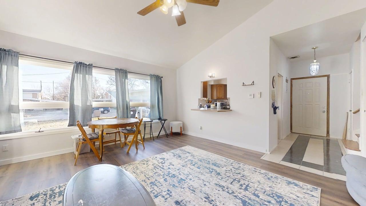 1507 Golfview Road, Unit 1507 Rantoul, IL 61866 - Photo 8 of 24 a living room with furniture and a table