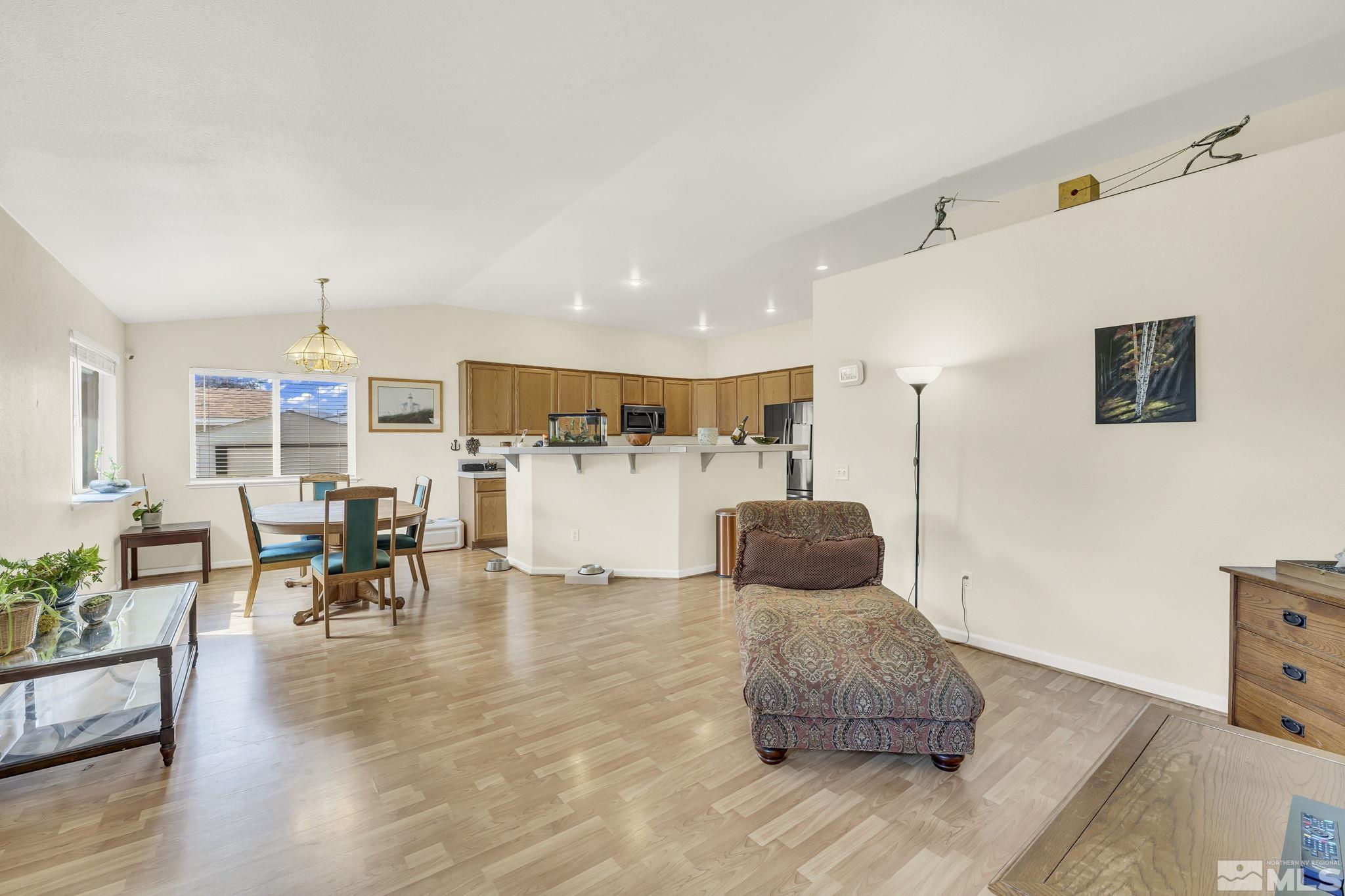 407 Sunshine Lane Fernley, NV 89408 - Photo 11 of 26 a living room with furniture and kitchen view