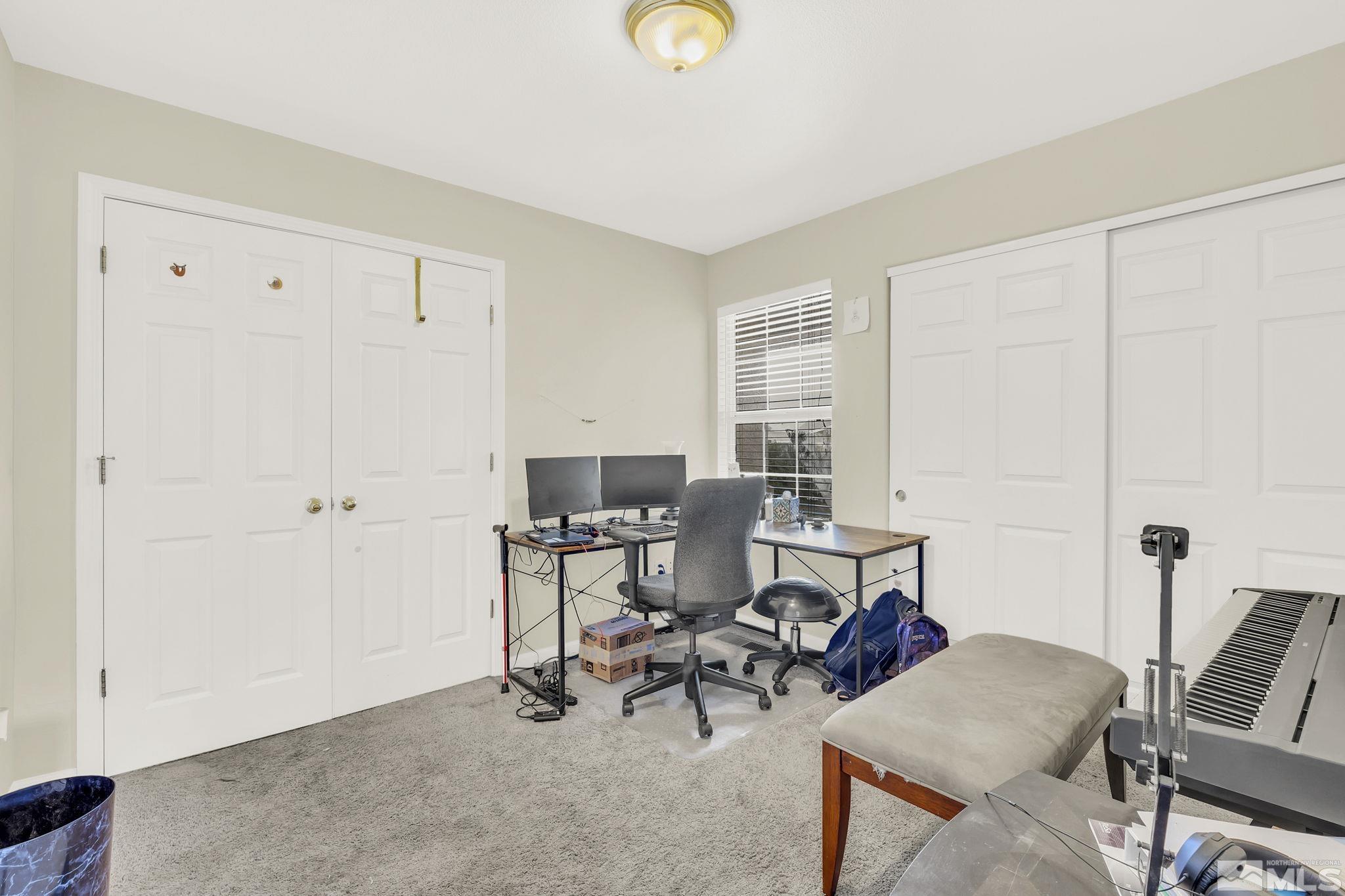 407 Sunshine Lane Fernley, NV 89408 - Photo 19 of 26 a view of a workspace with furniture