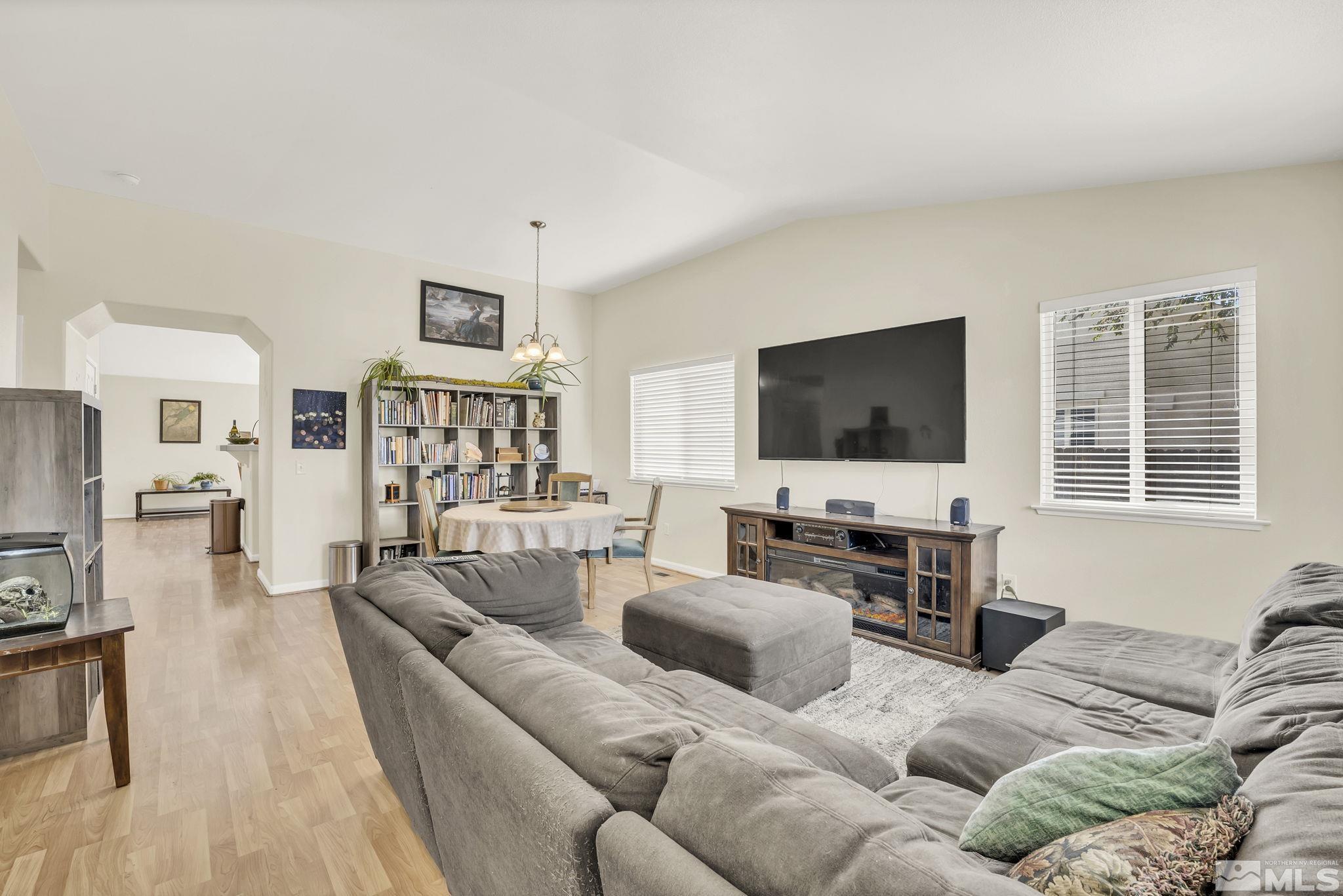 407 Sunshine Lane Fernley, NV 89408 - Photo 4 of 26 a living room with furniture and a flat screen tv