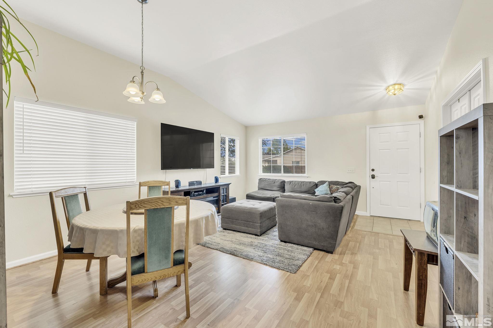 407 Sunshine Lane Fernley, NV 89408 - Photo 6 of 26 a view of a livingroom with furniture and a flat screen tv