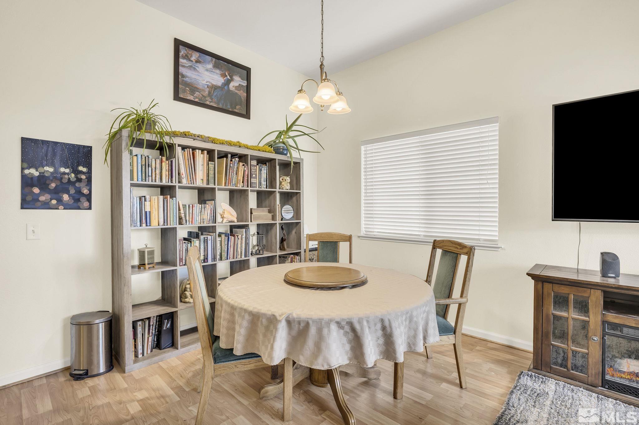 407 Sunshine Lane Fernley, NV 89408 - Photo 8 of 26 a dining room with furniture and window