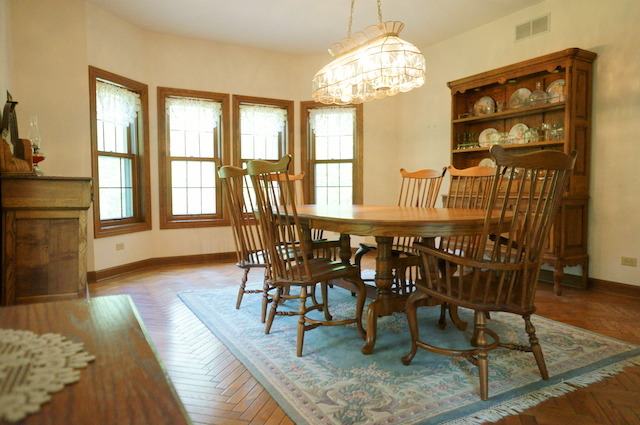 1760 East Burville Road Crete, IL 60417 - Photo 3 of 25 a view of a dining room with furniture window and wooden floor
